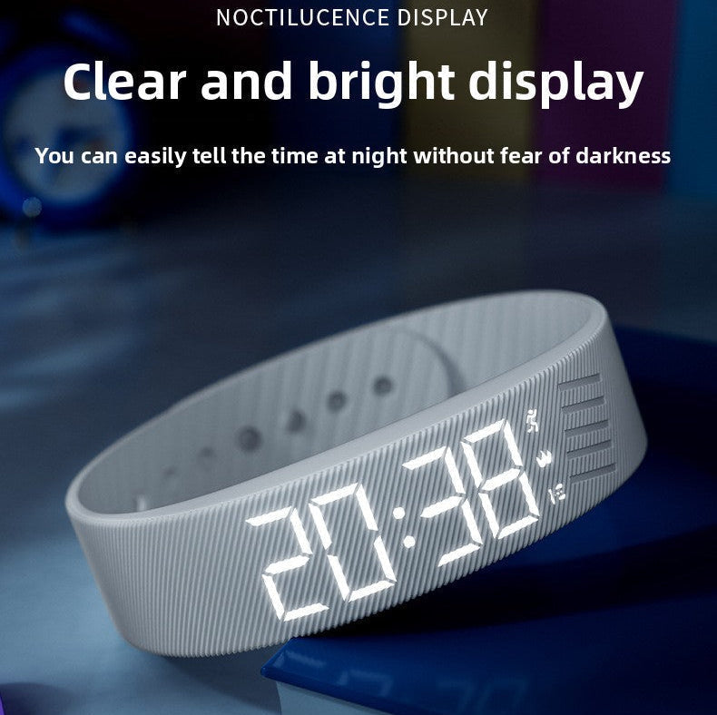 Digital wristwatch with clear and bright display on a dark background